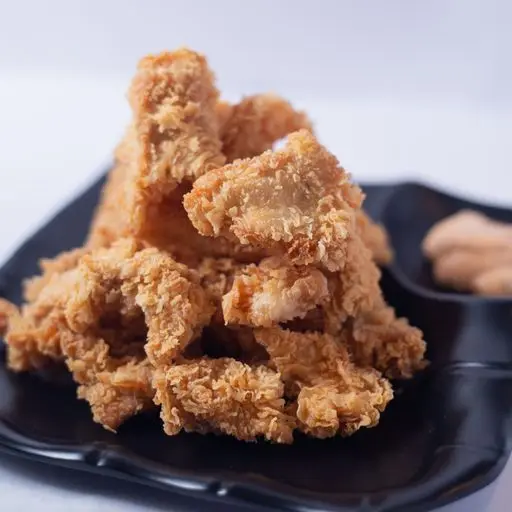 Serviervorschlag für Knuspriges Hühnerfleisch mit chinesischen Pilzen und Bambus